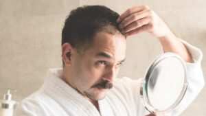 How does Finasteride work
